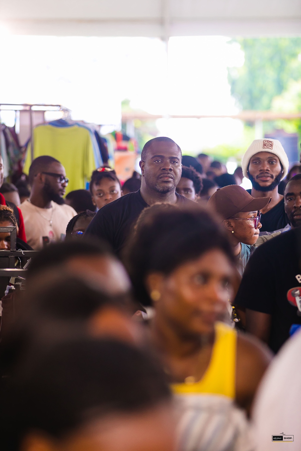 Attendees inside a packed Sales Fest clothing tent